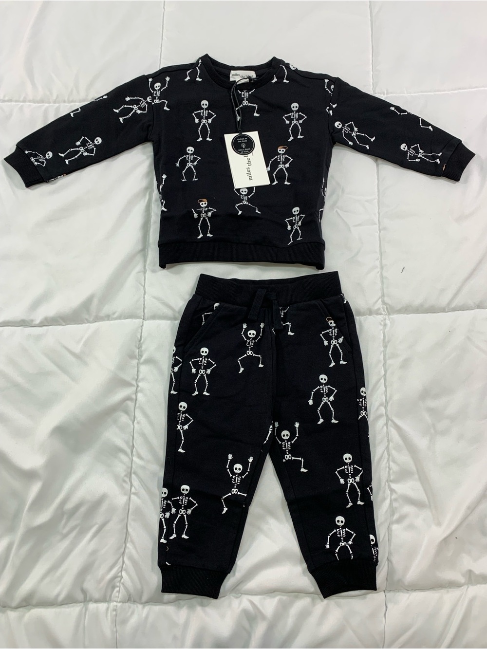 New miles the label skeleton sweater and pants set size 9M